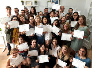 Graduates with their TEFL certificate