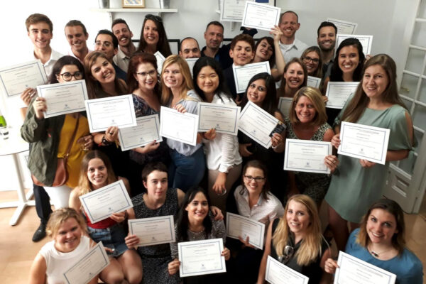 Graduates with their TEFL certificate